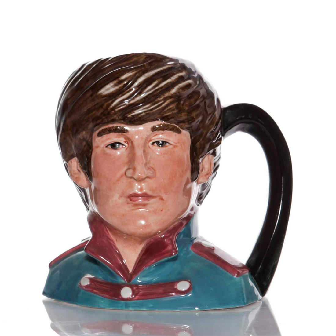 ROYAL DOULTON MID CHARACTER JUG, JOHN LENNON D6725: Modeled as guitarist and song writer for the group, The Beatles. Royal Doulton backstamp. Artist: Stanley James Taylor Issued: 1984-1991 Dimensions: 5.5"H Manufacturer: Royal Doulton Country of Origin