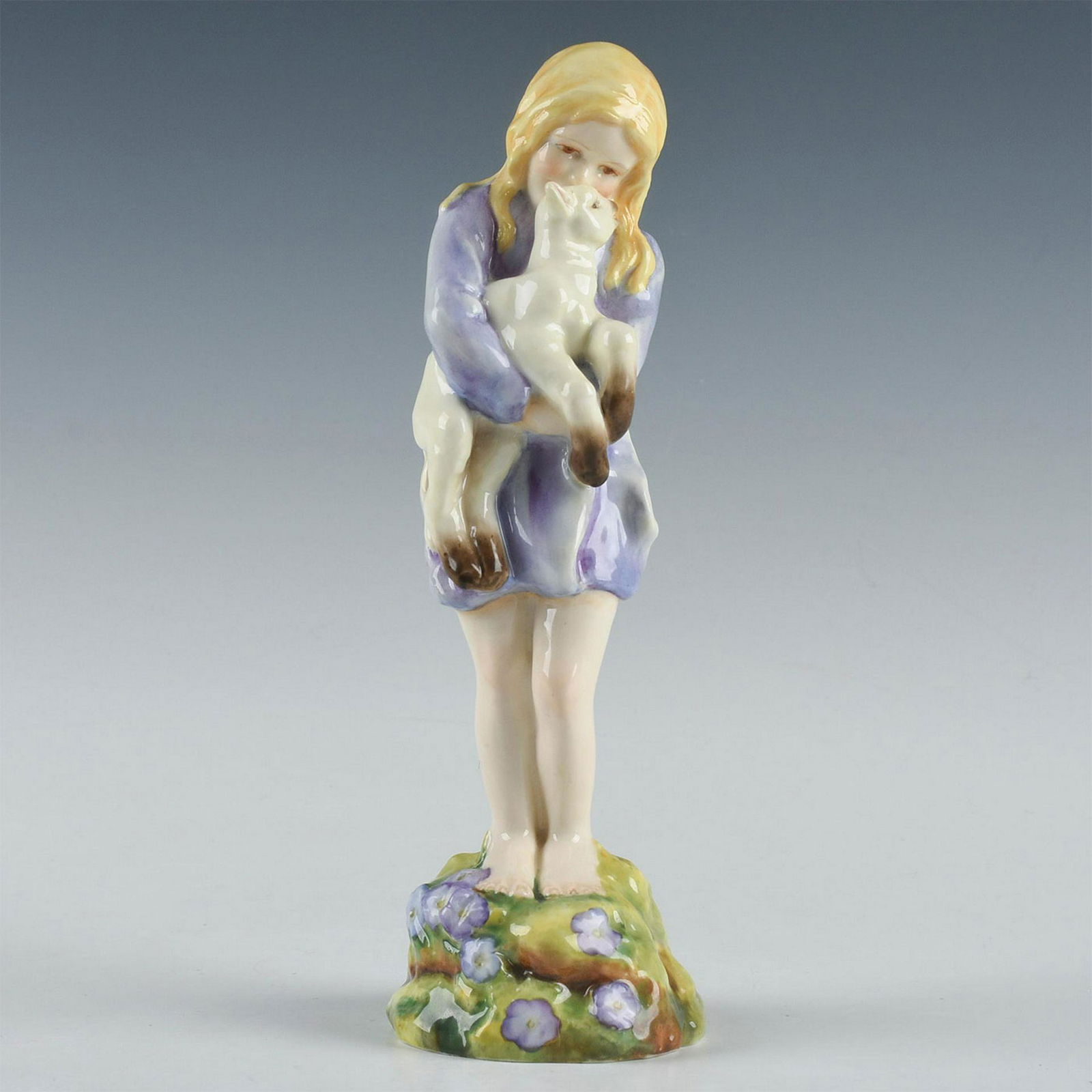 ROYAL WORCESTER FIGURINE, SPRING RW3012: Handpainted lavender dress. Interior bottom base marked in puce SPRING MODELLED BY P.G. DOUGHTY. Puce Royal Worcester backstamp. Issued: 1933-1959 Dimensions: 9"H Manufacturer: Royal Worcester Country