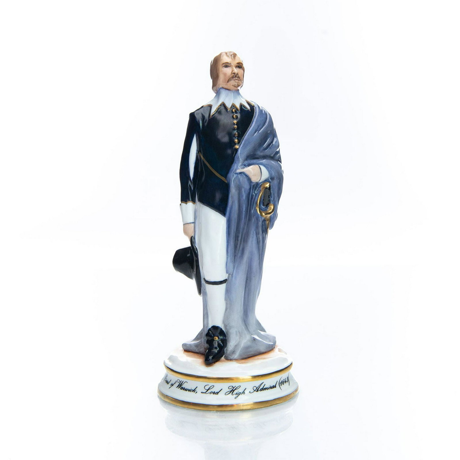 MICHAEL SUTTY FIGURINE, EARL OF WARWICK: Handpainted on white porcelain and accented in gold gilt. Limited edition, round base marked THE EARL OF WARWICK, LORD HIGH ADMIRAL (1643). Michael Sutty backstamp. Artist: Michael Sutty Issued: 20th 