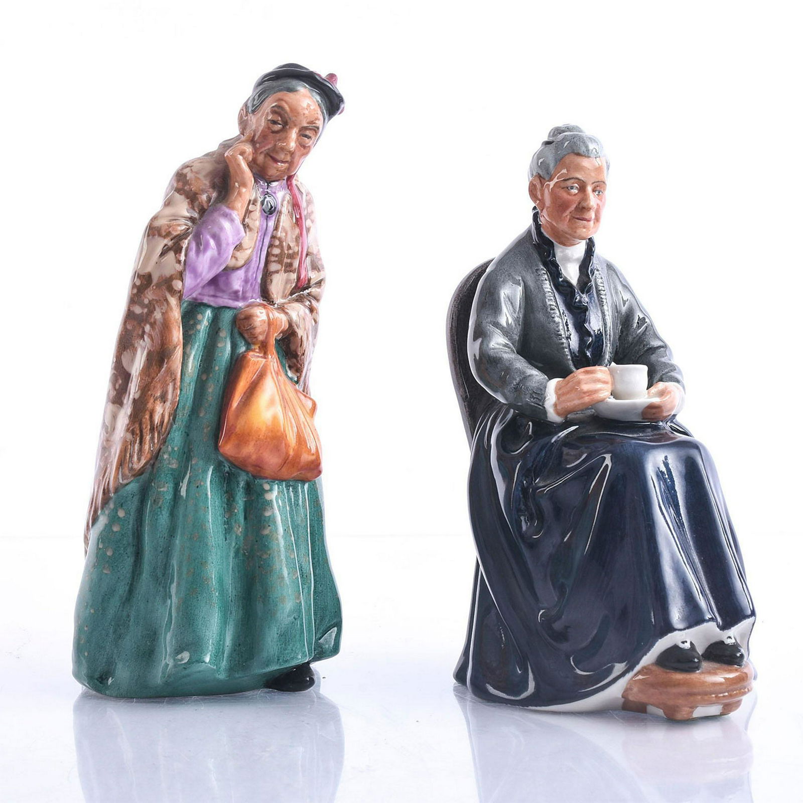 2 ROYAL DOULTON FIGURINES, BRIDGET, CUP OF TEA: HN #2322, HN #2070. Issued: 1940-1960 Dimensions: 7"L X 5"W, largest Manufacturer: Royal Doulton Country of Origin: England