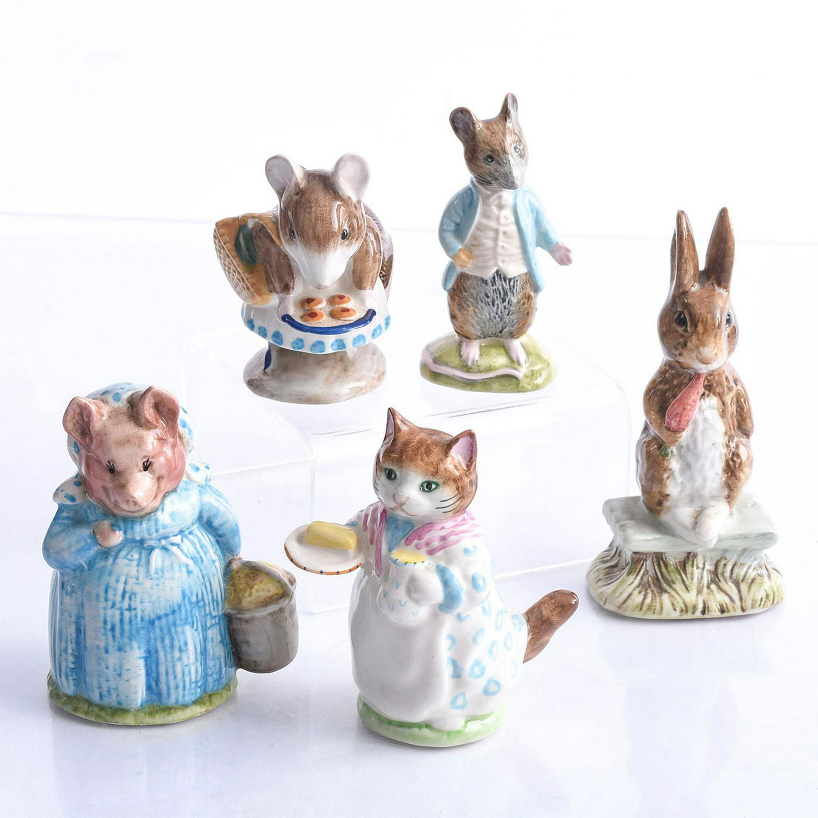 5 BESWICK BEATRIX POTTER ANIMAL FIGURES: Characters from the famed writer's children's books. Includes Ribby, Fierce Bad Rabbit, Appley Dapply, Aunt Pettitoes and Johnny Town-Mouse. Beswick backstamps. Issued: 20th c. Dimensions: 4.5"H, tall
