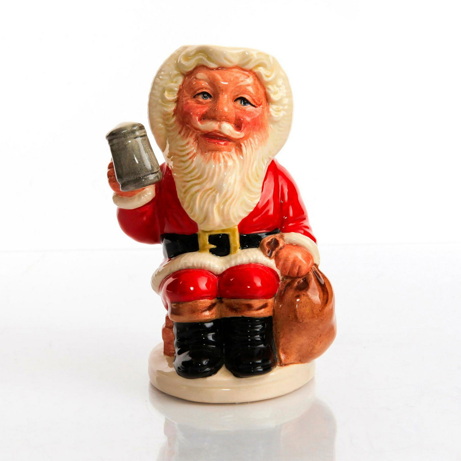 ROYAL DOULTON SMALL TOBY JUG, FATHER CHRISTMAS D6940: Handpainted, limited edition. Royal Doulton backstamp. Artist: William K. Harper Issued: 1993 Dimensions: 5.5"H Edition Number: 3137 Edition Size: 3500 Manufacturer: Royal Doulton Country of Origin: E