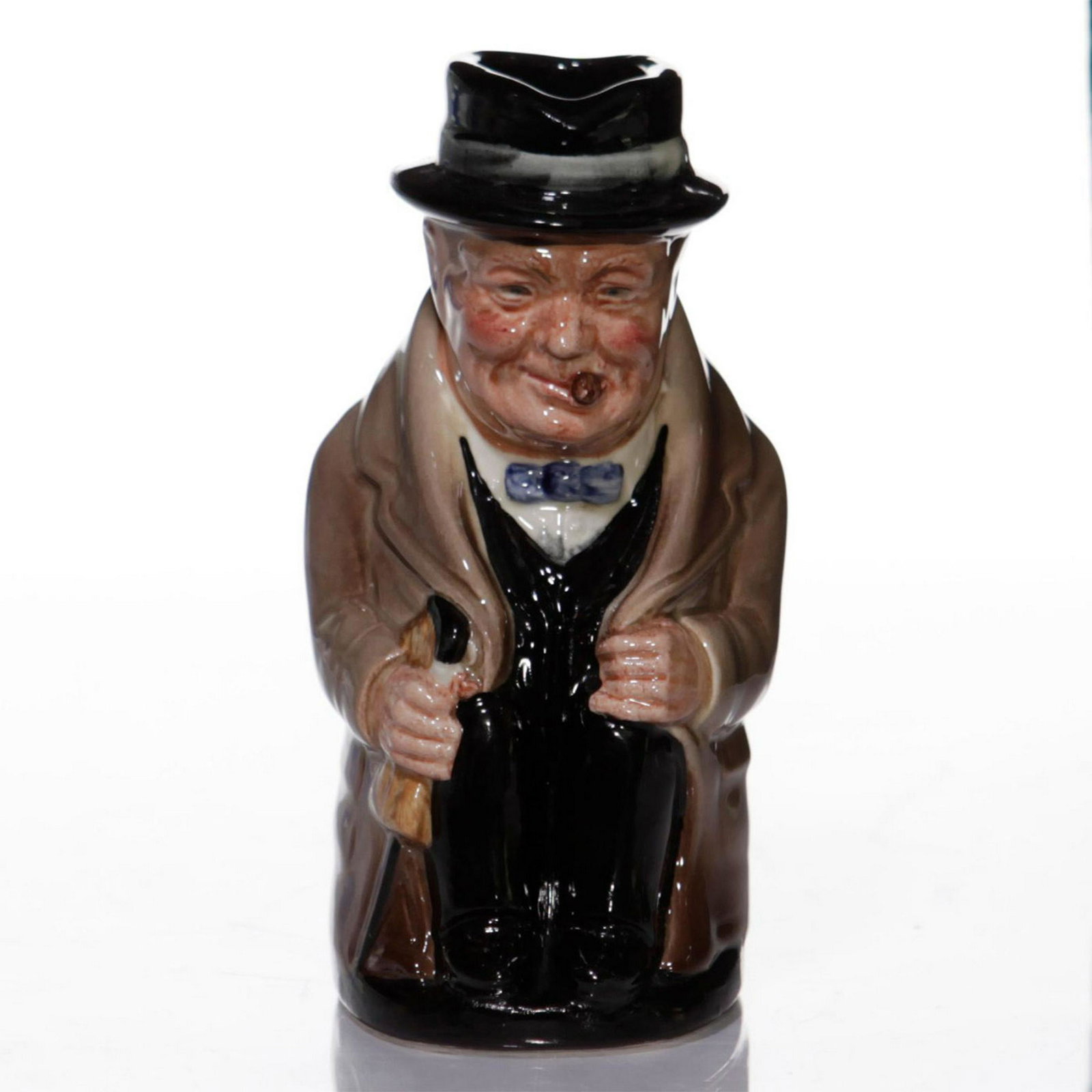 ROYAL DOULTON CHARACTER TOBY JUG, W. CHURCHILL D6175: Handpainted, medium size; bottom base marked WINSTON CHURCHILL. Royal Doulton backstamp. Artist: Harry Fenton Issued: 1941-1991 Dimensions: 4"H Manufacturer: Royal Doulton Country of Origin: England