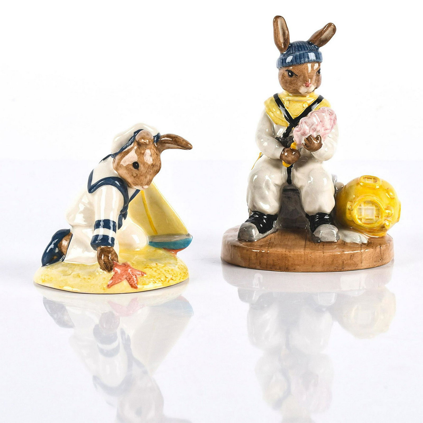 ROYAL DOULTON FIGURES SAILOR & DEEP SEA DIVER BUNNYKINS: DB166 and DB273, the second figurine is Limited Edition. Stamped to base ROYAL DOULTON ENGLAND and other marks. Issued: 1996, 2012 Dimensions: 4.5"H Edition Number: 1748 Edition Size: 3000 Manufacture