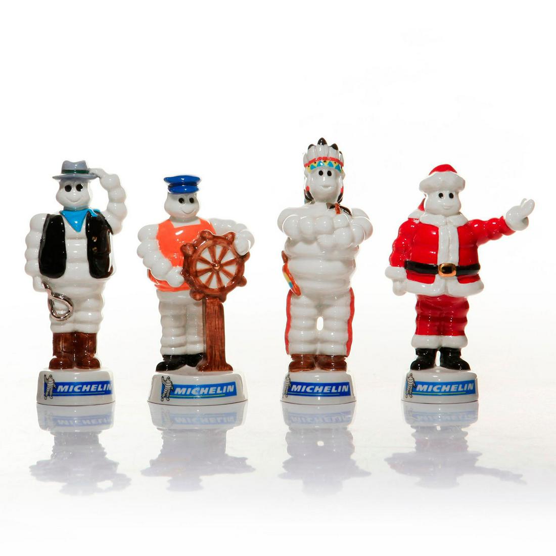 SET OF 4 WADE MICHELIN BIBENDUM MINIATURE FIGURINES: Includes Red Indian, Sailor, Cowboy and Santa. Limited editions. Fully stamped on underside. Issued: 2005, 2006 Dimensions: 5"H, tallest Manufacturer: Wade Country of Origin: England