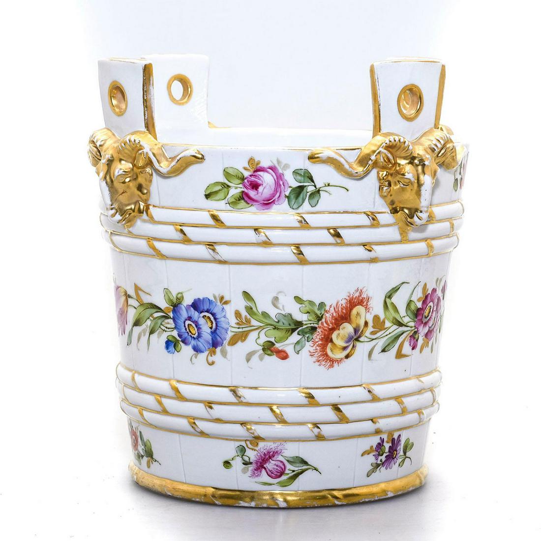 C.G. SCHIERHOLZ AND SOHN HANGING JARDINIERE: German porcelain; detailed gilded and floral design. Schierholz backstamp. Issued: 20th c. Dimensions: 7.5"H Manufacturer: C.G. Schierholz & Sohn Country of Origin: Germany