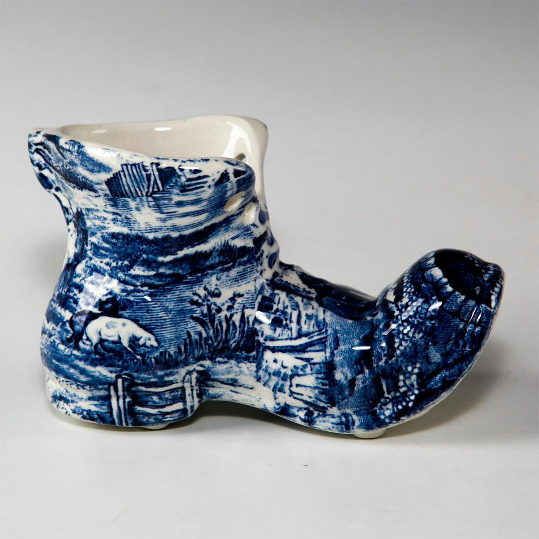 JAMES KENT OLD FOLEY STAFFORDSHIRE TRANSFERWARE: Delft-inspired potpourri modeled after a boot. Marked bottom. Issued: Early 20th c. Dimensions: 5"L x 3"H Manufacturer: James Kent Country of Origin: England