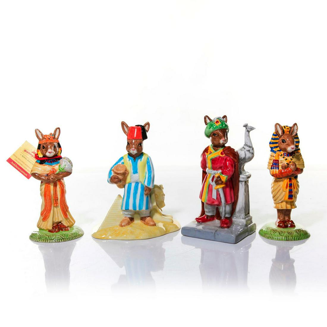 ROYAL DOULTON EGYPTIAN AND ARABIAN BUNNYKINS GROUP: Group of four with motifs of Egyptian history and the Near East. A group of four glazed figurines: Ankhesenamun DB295; Tutenkhamun DB296; The Egyptian limited edition of 1000 DB314; Arabian Nights lim