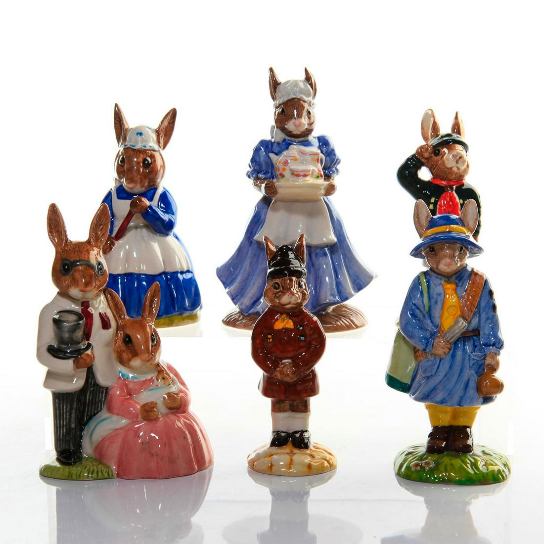 6 ROYAL DOULTON BUNNYKINS FIGURINES: Girl Guide, Brownie, Be Prepared, Clean Sweep, Mother, Family Photograph. DB431, DB61, DB56, DB6, DB403. DB67 "Lesley Wade" on underside. Issued: 20th c. Dimensions: 4.5"H, tallest Manufacturer: Royal