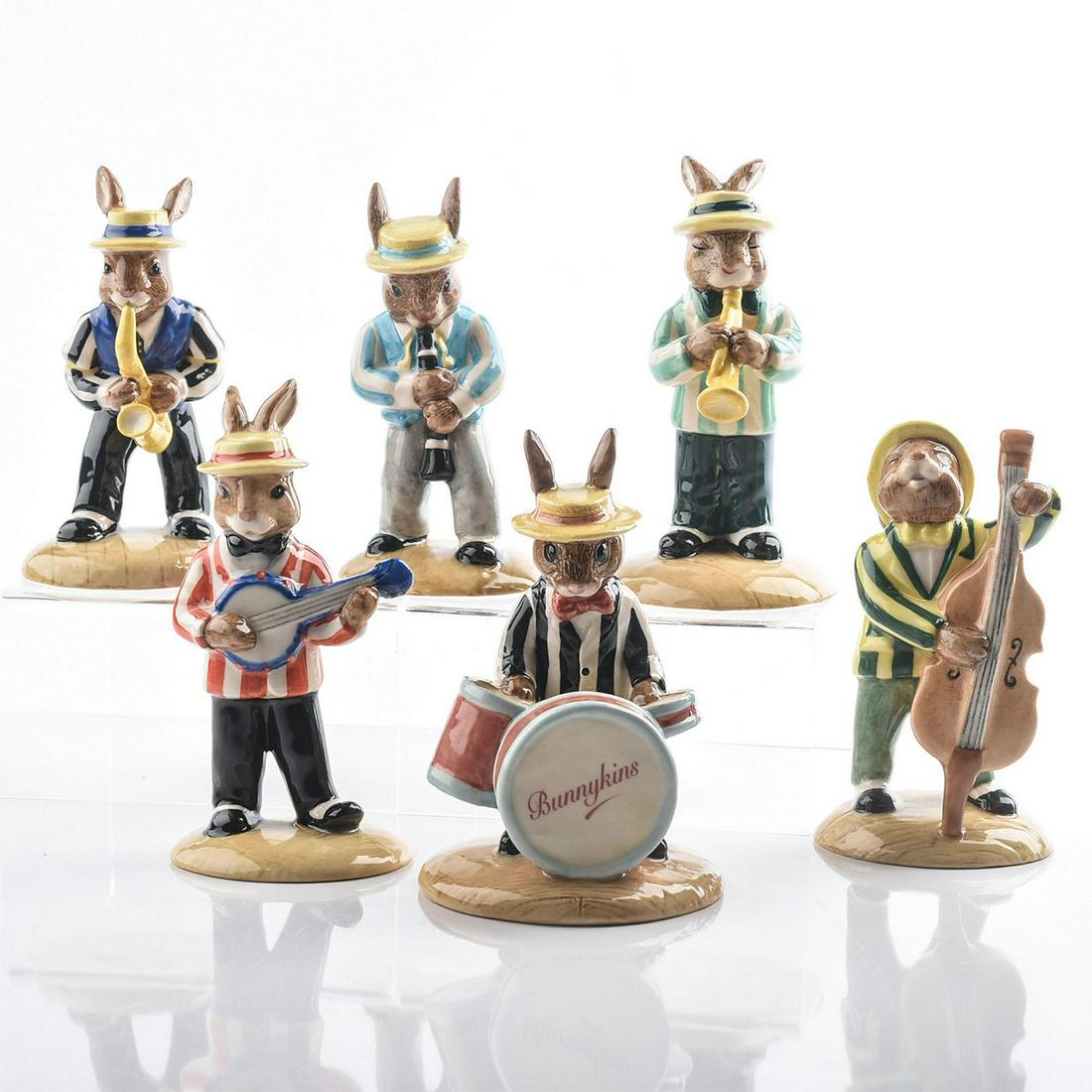 SET OF 6 ROYAL DOULTON JAZZ BAND COLLECTION BUNNYKINS: Special edition of 2500. Made for the U.K.I. Ceramics Ltd. Saxophone player DB186, Clarinet Player DB184, Double Bass Player DB185, Banjo Player DB182, Drummer DB250 and Trumpet Player DB210. Doulton 