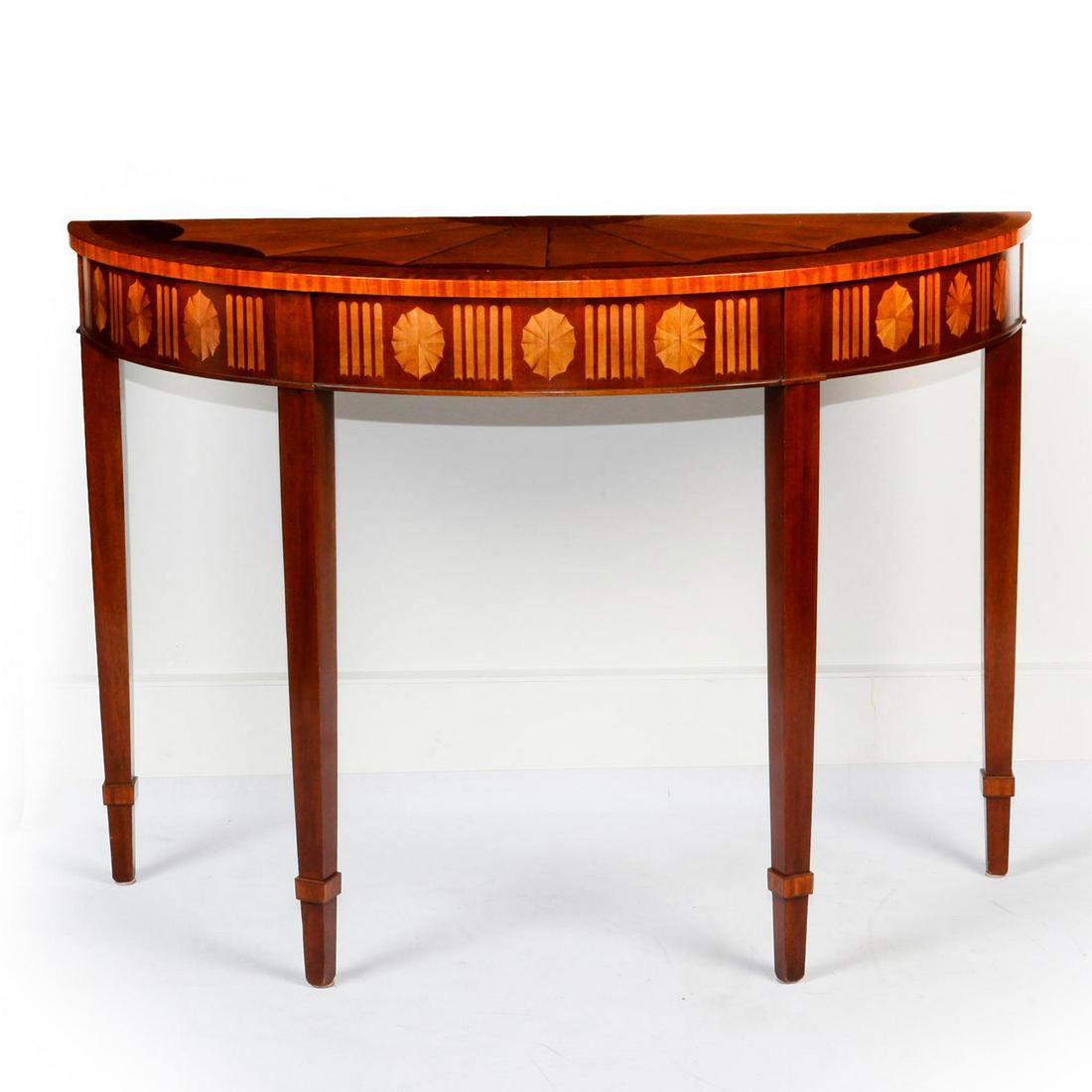 GEORGIAN STYLE DEMILUNE CONSOLE TABLE: Mahogany, rosewood, fan inlaid top and faux fluted legs. Total weight approx. 30lbs. Issued: 20th c. Dimensions: 32"H x 19"L x 45"W