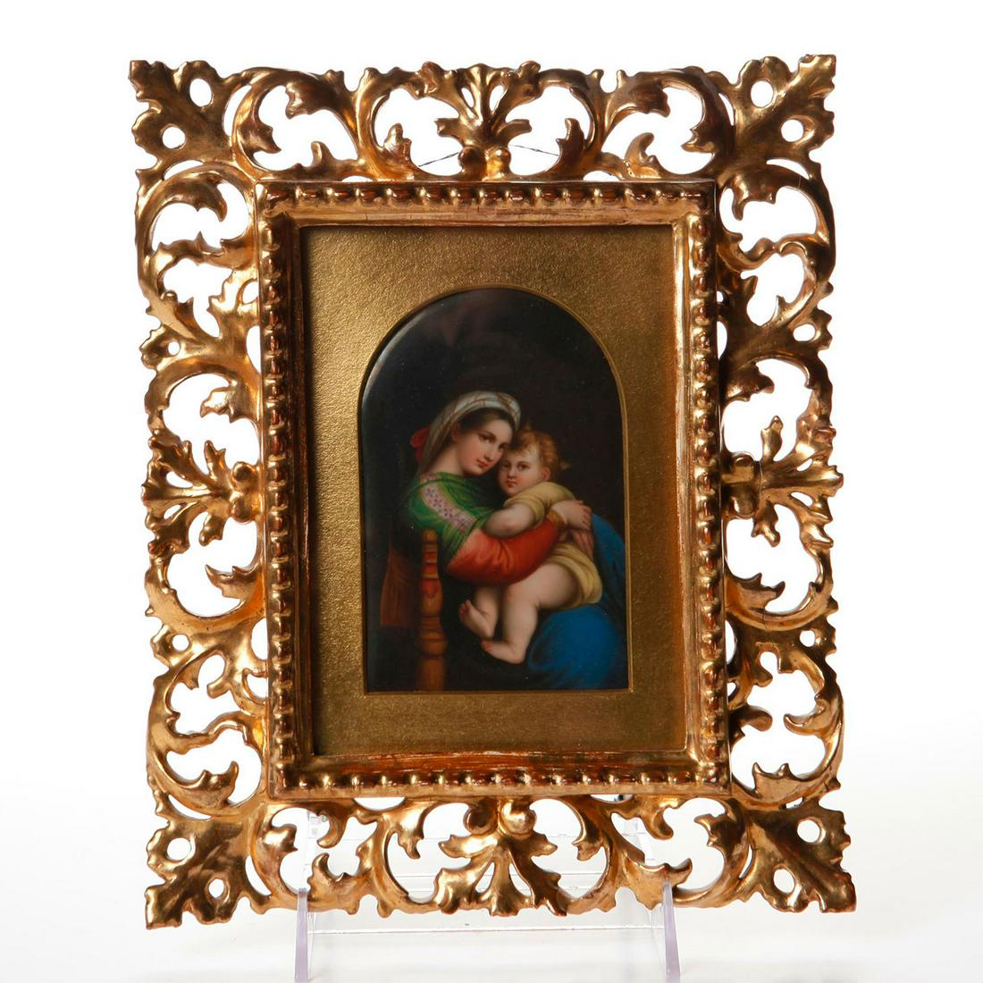 CONTINENTAL PORCELAIN ICON PLAQUE MADONNA AND CHILD: KPM style. Polychrome enameled decoration, gilt wood frame. Modeled in the KPM style, a porcelain plaque of the Madonna and Child, Germany, late 19th century, after Rafael. Polychrome enameled portrai