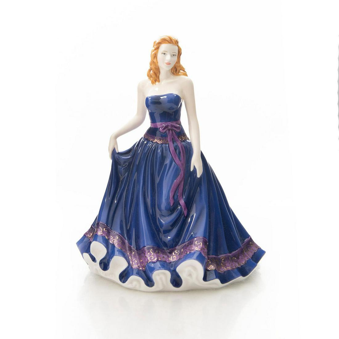 ROYAL WORCESTER FIGURINE, FAYE: Figurine of the Year 2010. Blue and lavender colorway. Worcester backstamp. Artist: M. Pashley Issued: 2009 Dimensions: 9"H Manufacturer: Worcester Country of Origin: England