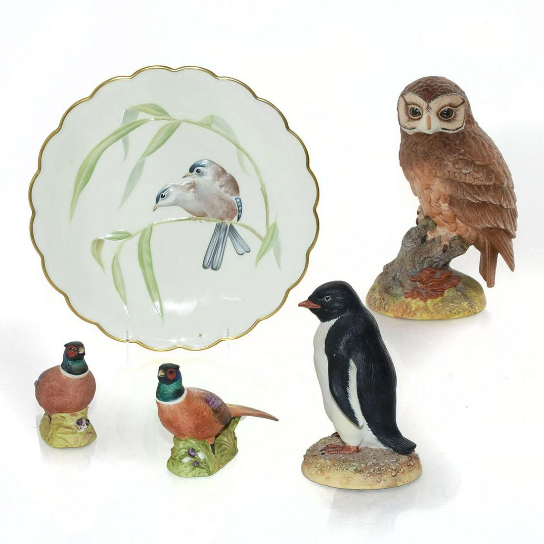 4 AYNSLEY BIRD FIGURINES, 1 ROYAL WORCESTER PLATE: 2 pheasants, tawny owl, penguin. Blue winged sivas on plate. Signed by artist on underside. Plate stamped on underside. Artist: John Aynesly Issued: 20th c. Dimensions: 8"H, tallest Manufacturer: Ayns