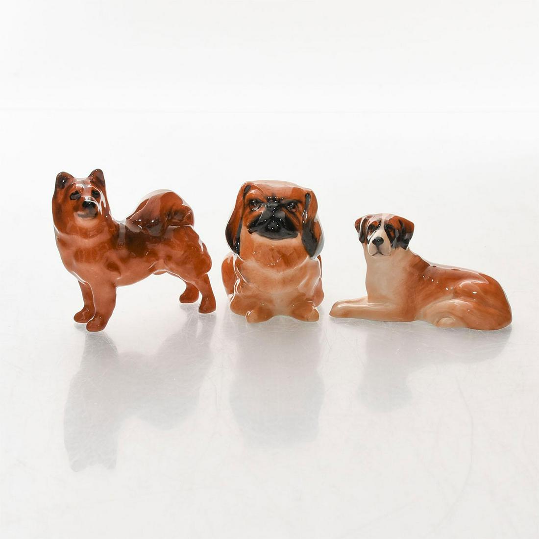 3 ROYAL DOULTON CERAMIC DOG FIGURINES: Chow Chow K15, St Bernard K19, Pekinese K6. Royal Doulton backstamp on bottom. Issued: 20th c. Dimensions: 2.25"H, tallest Manufacturer: Royal Doulton Country of Origin: England