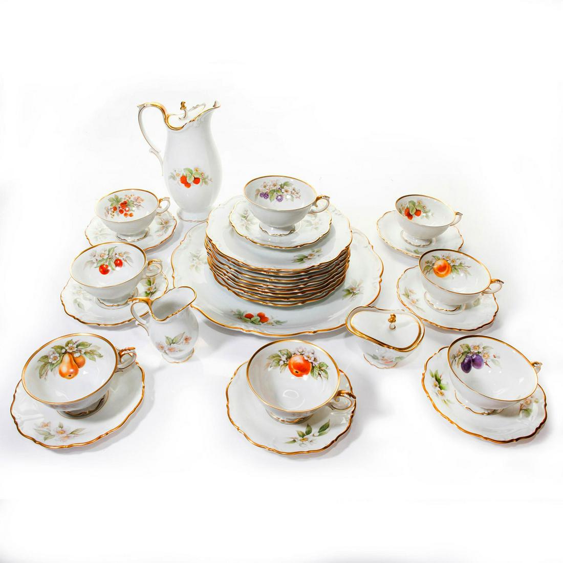 BAVARIAN TABLEWARE, 8 PLACE SETTINGS: 27 pc. White china, fruit design, Dresden shaped, gilded rim. Stamped on bottom. Issued: 20th c. Dimensions: 13"W, widest Manufacturer: Bavaria Country of Origin: Germany