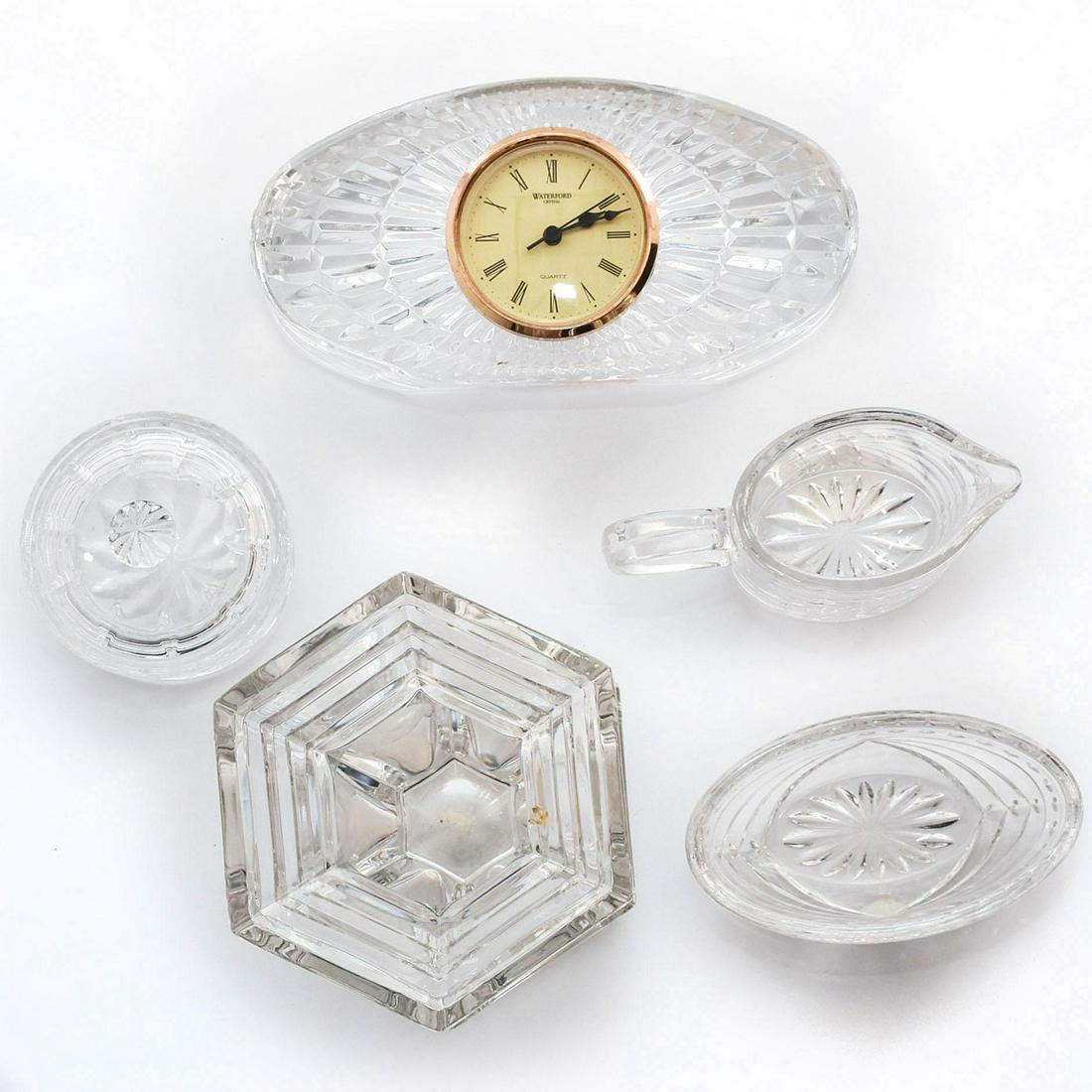 5PC WATERFORD CRYSTAL HOMEWARE ITEMS: Vase, clock, lidded bowl, pitcher and dish. Waterford backstamps. Issued: 20th c. Dimensions: 10.25"H x 5"W, largest Manufacturer: Waterford Country of Origin: Germany