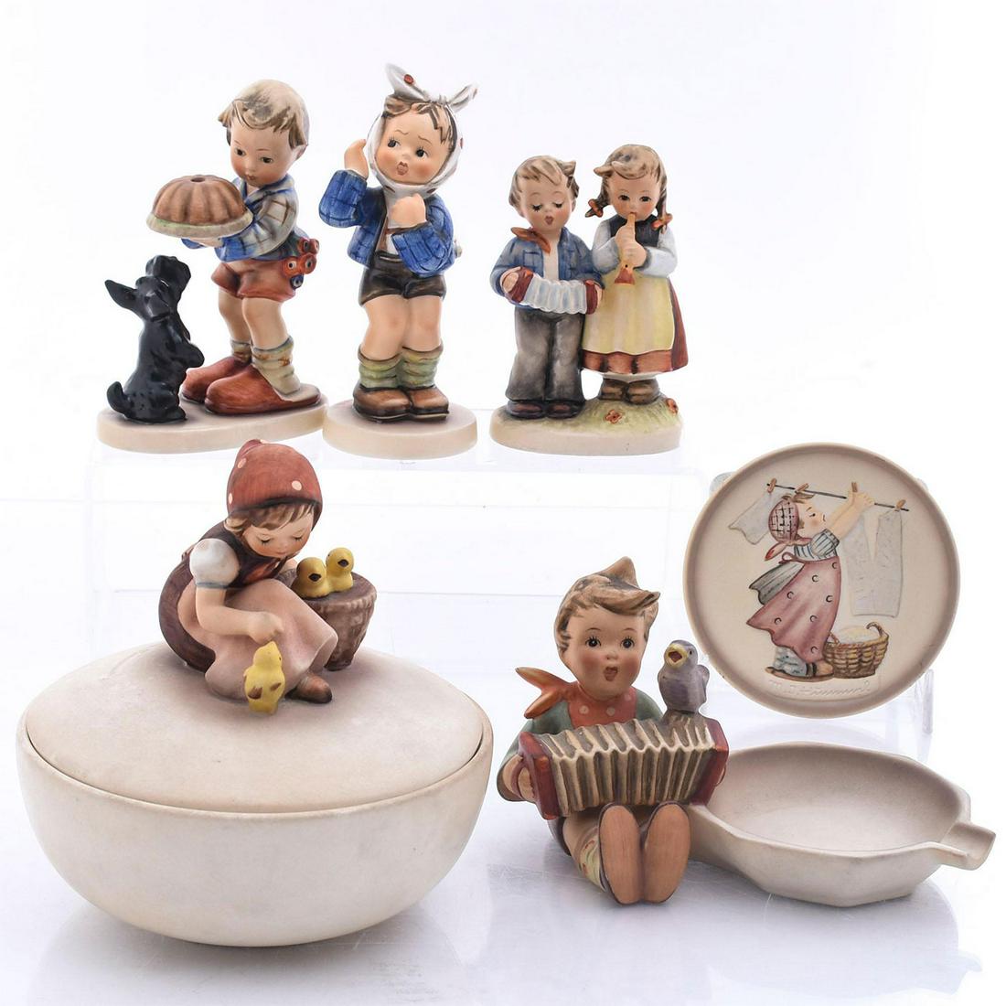6 COLLECTIBLE GOEBEL HUMMEL ITEMS: Handpainted, marked. 1 ashtray, 1 "Wash Day" miniature collectors' Plate, 1989, w. box. 1 is cover bowl with chick girl sits on top. Dimensions: 6"H x 6"W, bowl Manufacturer: Goebel Country of Origin:
