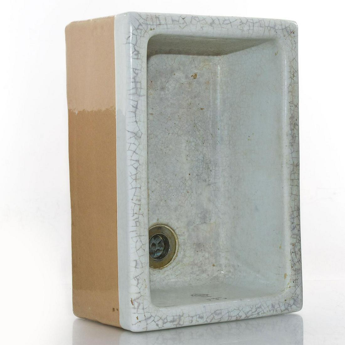 ROYAL DOULTON STONEWARE BELFAST BUTLER SINK: Glazed white ceramic, produced in England for London market. An original Royal Doulton Belfast Butler sink, with built-in drain and pipe. Produced for use in London, as indicated by the lack of an ove