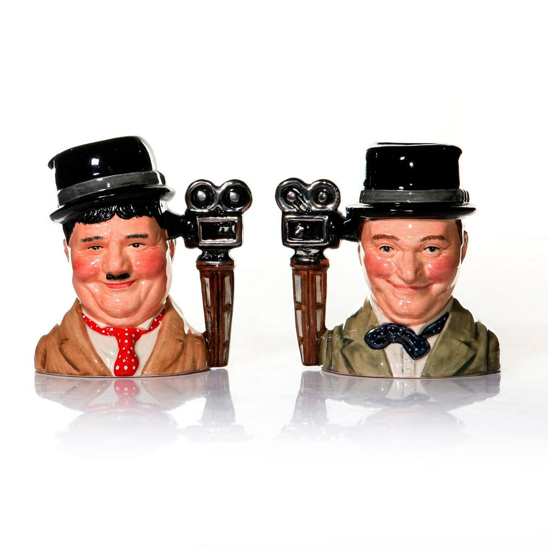 2 ROYAL DOULTON LG CHARACTER JUGS LAUREL & HARDY: D7008, D7009. Produced in a limited edition of 3500. Stamped to base ROYAL DOULTON ENGLAND. Artist: William Harper Issued: 1995 Dimensions: 4.25"H Edition Number: 62 Edition Size: 3500 Manufacturer: R