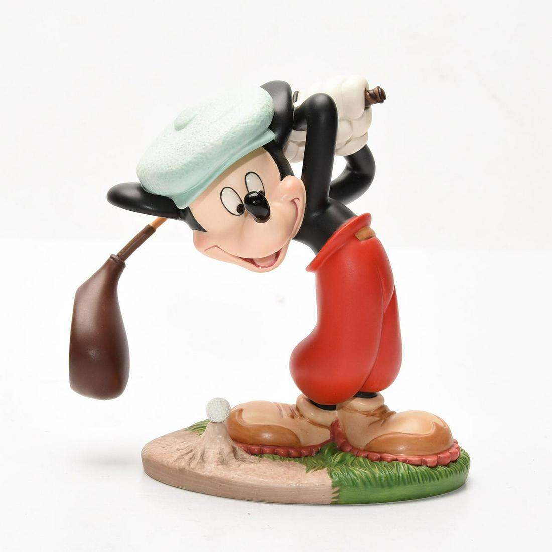 DISNEY CLASSICS MICKEY MOUSE CANINE CADDY GOLF FIGURINE: Depicts Mickey in his 1941 golf outing film. DISNEY backstamp. Stamped to base WALT DISNEY CLASSICS COLLECTION MOCKEY MOUSE CANINE CADDY. Collectors box. Certificate of Authenticity. Issued: c. 1991 D