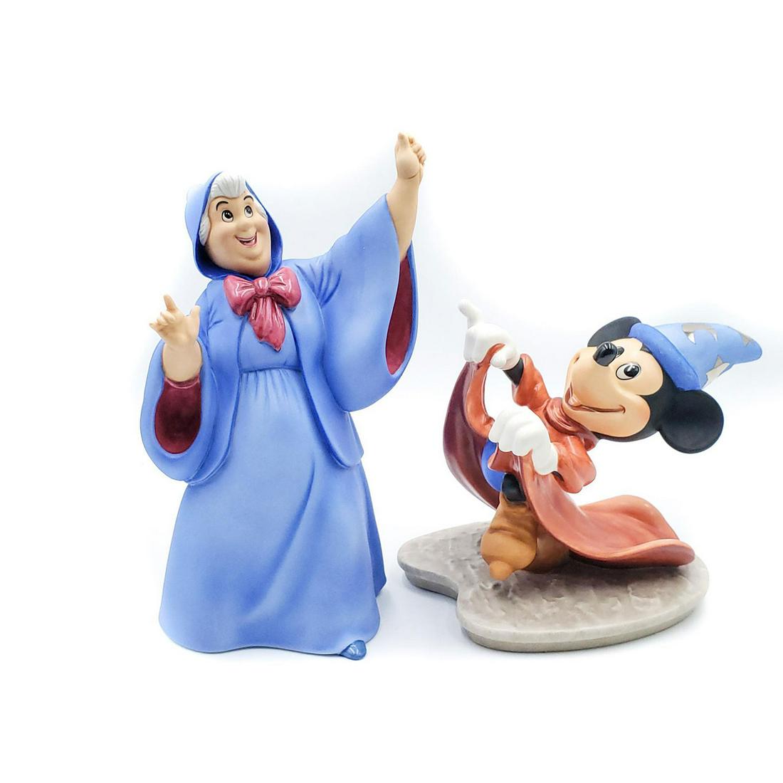 2 WALT DISNEY CLASSICS FIGURINES: Fantasia Mickey, Fairy Godmother. In original packaging, with Certificates of Authenticity. Issued: 1990s Dimensions: 11.5"L x 8"H x 8"W, each box Manufacturer: Walt Disney Co.