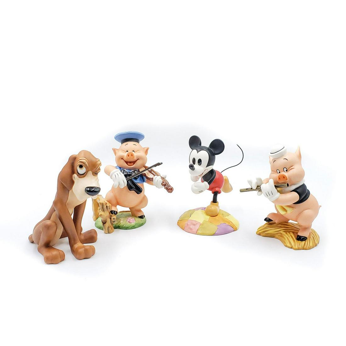 4 WALT DISNEY CLASSICS COLLECTION FIGURINES: Mickey, Bruno, Fiddler Pig, Fifer Pig. In original packaging. Issued: 1990s Dimensions: 8"L x 8"W x 5"H, each box Manufacturer: Walt Disney Co. Country of Origin: China