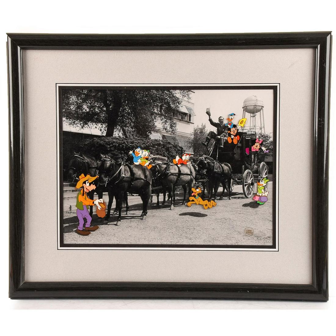 WALT DISNEY FRAMED LIMITED EDITION CEL WALT'S: Numbered. Mickey, Minnie, Donald, Daisy and others. DISNEY stamp. This is a rare limited edition mixed media cel that incorporates an original black and white photograph of legendary illustrator and f