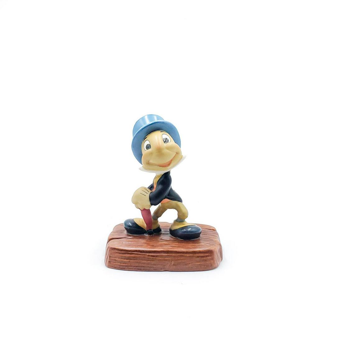 WALT DISNEY CLASSICS FIGURINE, JIMINY CRICKET, 1993: Figure of the talking cricket from Walt Disney movie, Pinocchio. Walt Disney Collectors Society. Complete with Certificate of Authenticity. Figure, 4"H. Issued: 1993 Dimensions: 7.75"L x 5"W, box Manu