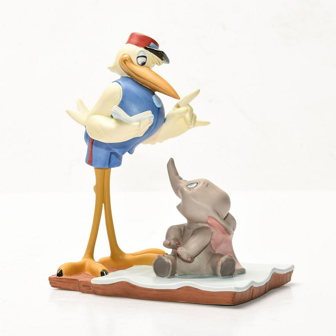 DISNEY CLASSICS GROUP FIGURINE, DUMBO, BUNDLE OF JOY: Scene from the 1941 classic animated film. DISNEY backstamp. Stamped to base WALT DISNEY CLASSICS COLLECTION BUNDLE OF JOY MESSENGER STORK AND DUMBO. Certificate of Authenticity. Collectors box. Issue