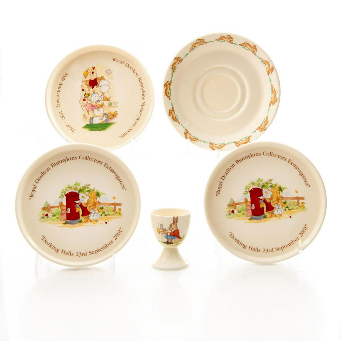 5 ROYAL DOULTON BUNNYKINS TABLEWARE PIECES: 3 Collector's trays, 1 saucer and 1 footed egg cup. Doulton backstamp. Issued: 20th c. Dimensions: 6"W, largest Manufacturer: Royal Doulton Country of Origin: England