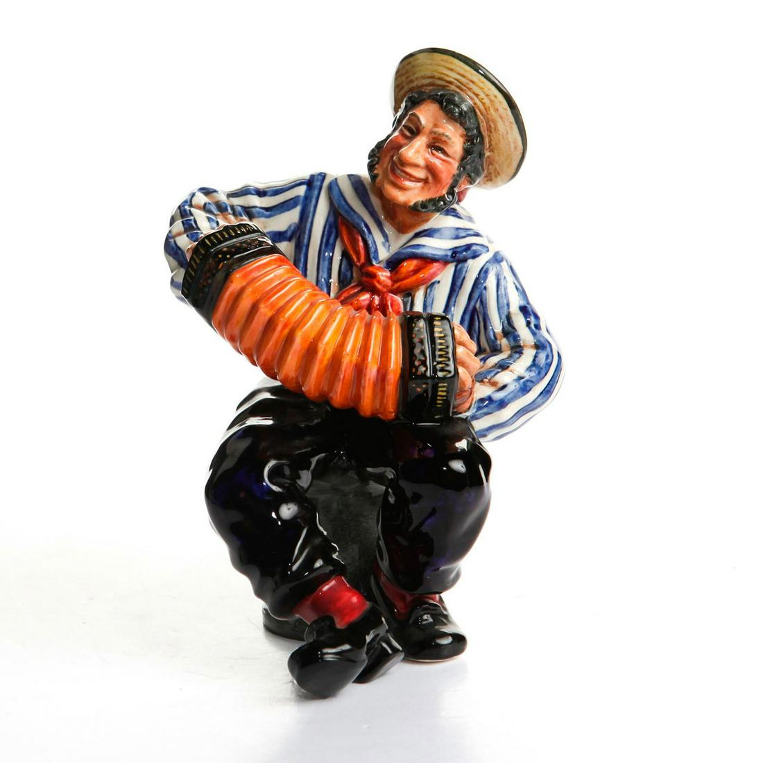 ROYAL DOULTON FIGURINE, JOLLY SAILOR HN2172: Character study series. Black, blue and brown colorway. Doulton backstamp. Artist: M. Nicoll Issued: 1956-1965 Dimensions: 6.75"H Manufacturer: Royal Doulton Country of Origin: England