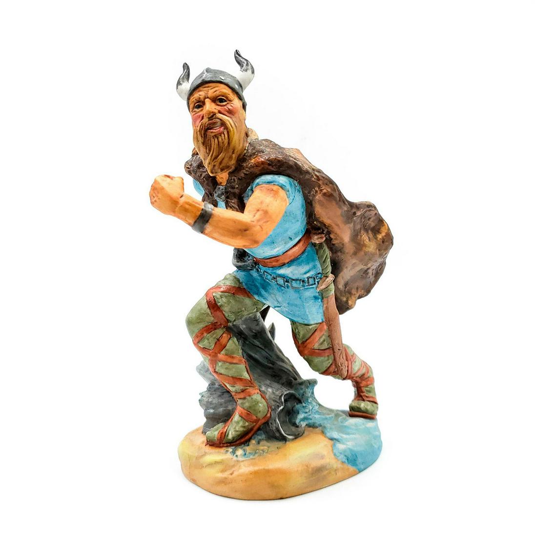 ROYAL DOULTON MATTE FIGURINE, THE VIKING HN2375: Men of History series. Blue and brown. Artist: J. Bromley Issued: 1973-1976 Dimensions: 8.75"H Manufacturer: Royal Doulton Country of Origin: England