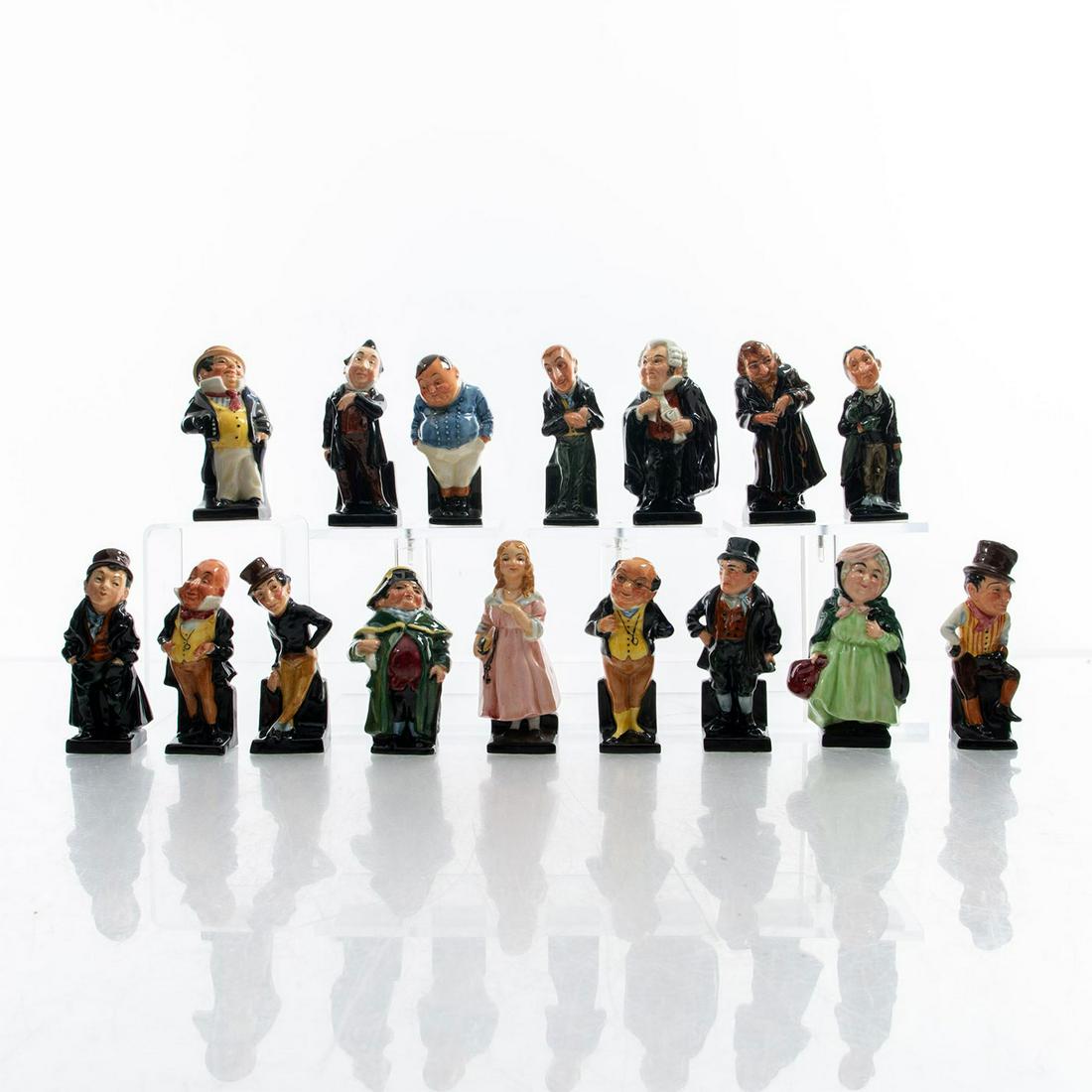 16 ROYAL DOULTON FIGURINES, DICKENS SERIES: Classic characters from Charles Dickens stories. Little Nell M51, Sairey Gamp M46, Stiggins M50, Buz Fuz M53, Sam Weller M48, Fat Boy M44, Fagin M49, Bill Sykes M54, Artful Dodger M55, Mr. Micawber M4
