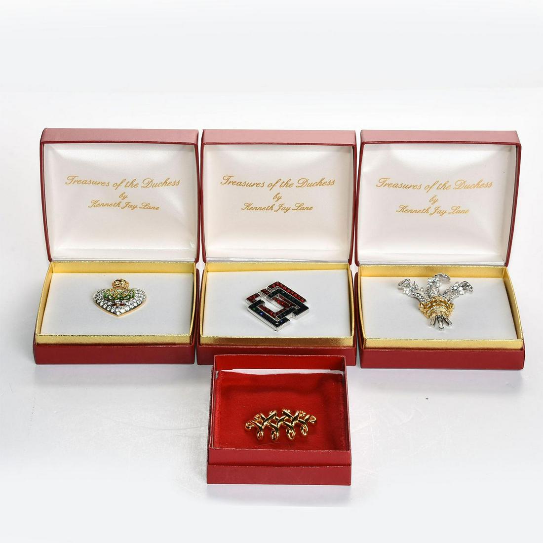 4 KENNETH JAY LANE BROOCHES: 3 reproductions of pins worn by the Duchess of Windsor. 1 other in gold. Artist: Kenneth Jay Lane Issued: 20th c. Dimensions: 4.5"H, tallest