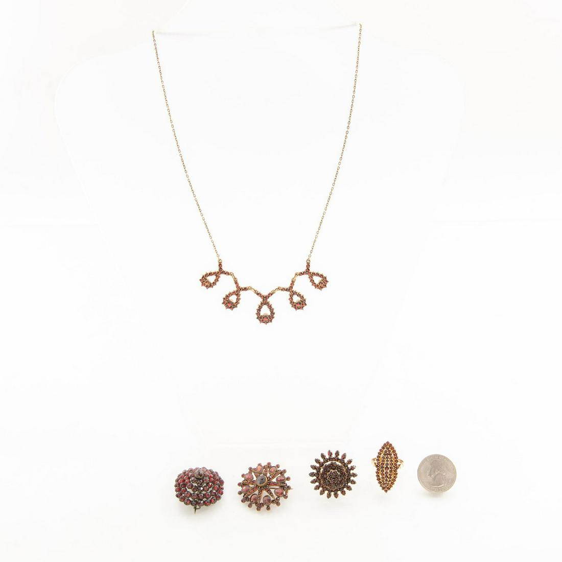 FIVE VICTORIAN GARNETS JEWELRY, RINGS, PINS & NECKLACE: Bohemian garnets, cut in Prague. Silver, gold filled and 9k gold. A group of five pieces of Art Nouveau jewelry, featuring exquisite deep red Bohemian garnets, cut in Prague c. 1880. 9 karat gold neck