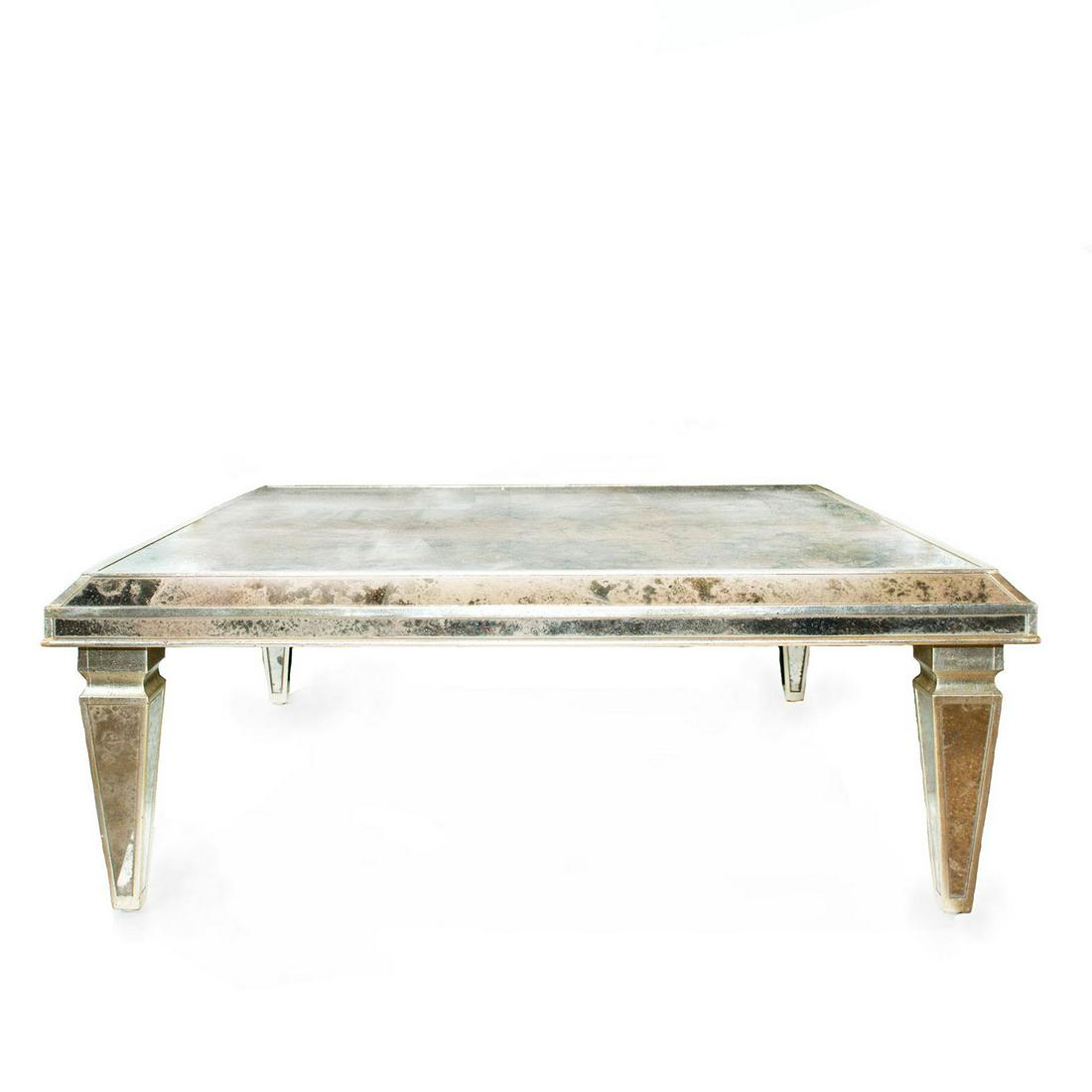 SILVER MIRROR FINISH COFFEE TABLE: Silver painted wood, with mottled mirror finish. Age and use related wear. Issued: 20th c. Dimensions: 48"L x 48"W x 18"H