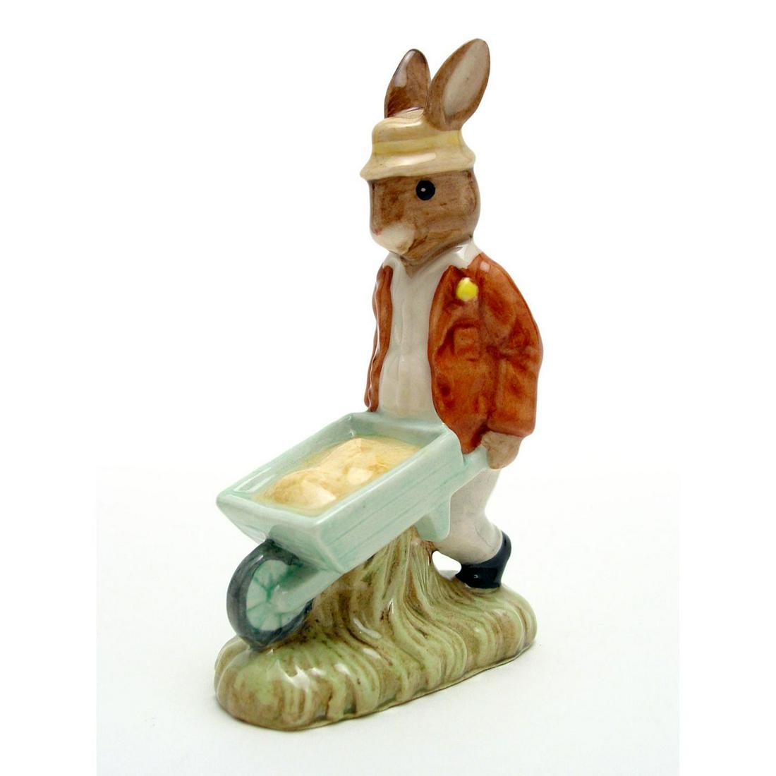 GARDENER DB156 - ROYAL DOULTON BUNNYKINS: Royal Doulton Bunnykins, Gardener Bunnykins DB156 (brown jacket, white shirt, grey trousers, light green wheelbarrow). Designed Warren Platt, issued 1996 - 1998. Size 4.25"H Artist: W. Platt Issued: 1