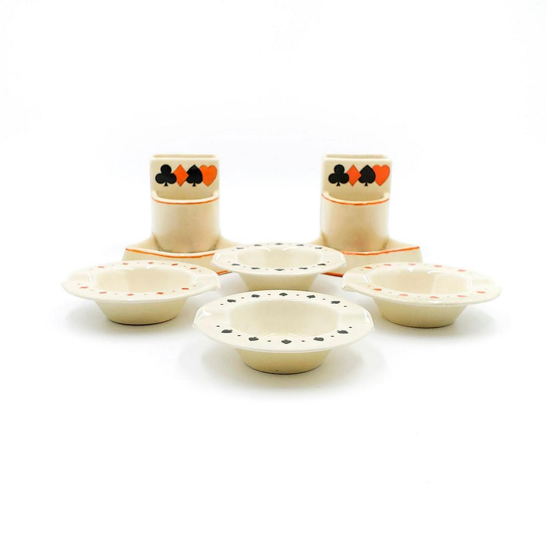 ROYAL DOULTON CLARICE CLIFF INSPIRED SMOKING SET: Art Deco match holders, ashtrays; playing card theme. Doulton backstamped. Issued: 20th c. Dimensions: 3.5"W, largest Manufacturer: Royal Doulton Country of Origin: England