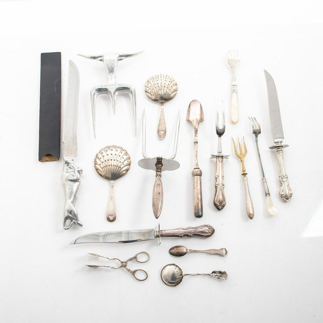 15 PIECES, FLATWARE/SERVING UTENSILS: Some sterling handles, unmarked silver/silverplate, one marked 800. Includes 3 carving sets. Issued: 20th c. Dimensions: 14"L, longest