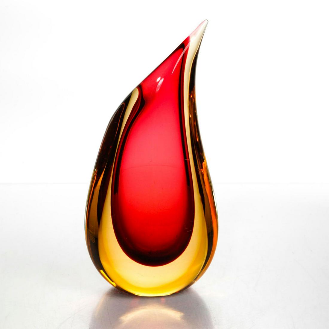 MURANO ART GLASS VASE: Ruby and amber color, signed Murano Italy to bottom. Issued: c. 2000 Dimensions: 5"L x 3"W x 10"H Country of Origin: Italy