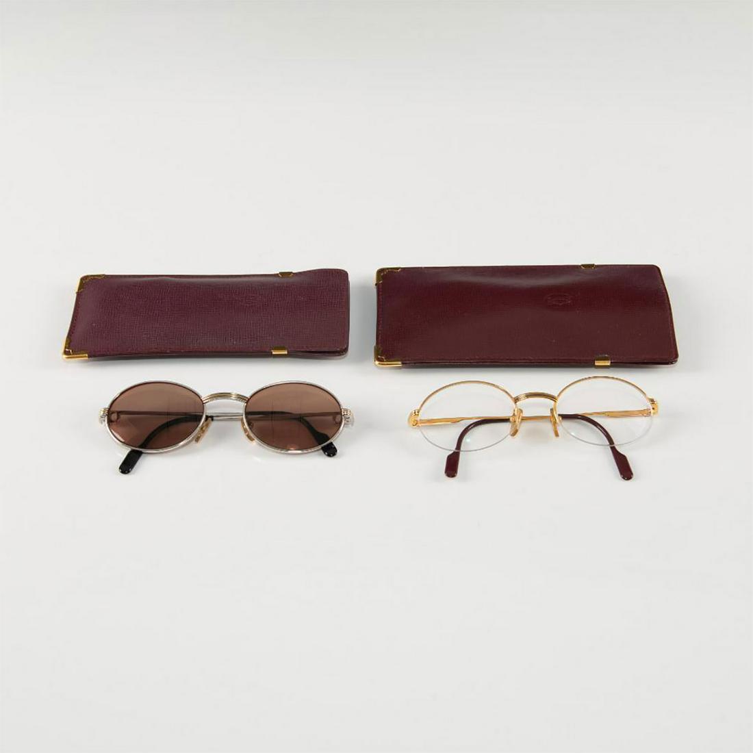 CARTIER VINTAGE EYEGLASSES & SUNGLASSES 51-20: Saint Honore model includes original Cartier soft leather cases. Eyeglasses in 22kt gold-plated frames with prescription oval lens. Sunglasses in platinum and 22kt gold plated frames with prescription