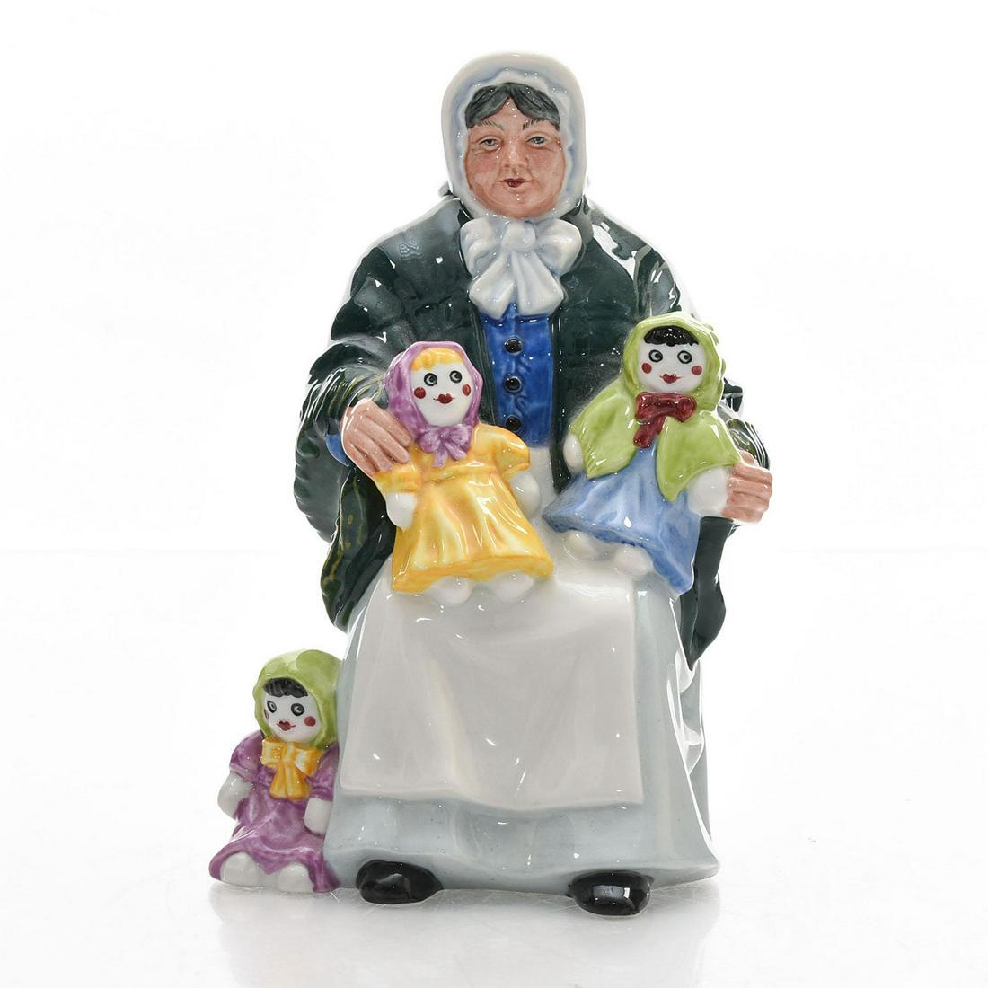 ROYAL DOULTON FIGURINE, RAG DOLL SELLER HN2944: - Street Vendor Artist: Robert Tabbenor Issued: 1983 - 1995 Dimensions: 7"H Manufacturer: Royal Doulton