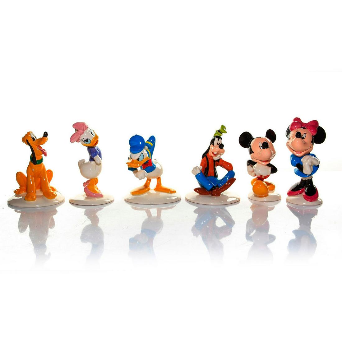 ROYAL DOULTON MICKEY MOUSE COLLECTION FIGURINES: Six commemorative 70th Anniversary Walt Disney figures. Mickey Mouse MM1; Minnie Mouse MM2; Donald Duck MM3; Daisy Duck MM4; Goofy MM5; Pluto MM6. Stamped to base ROYAL DOULTON, DISNEY and other marks