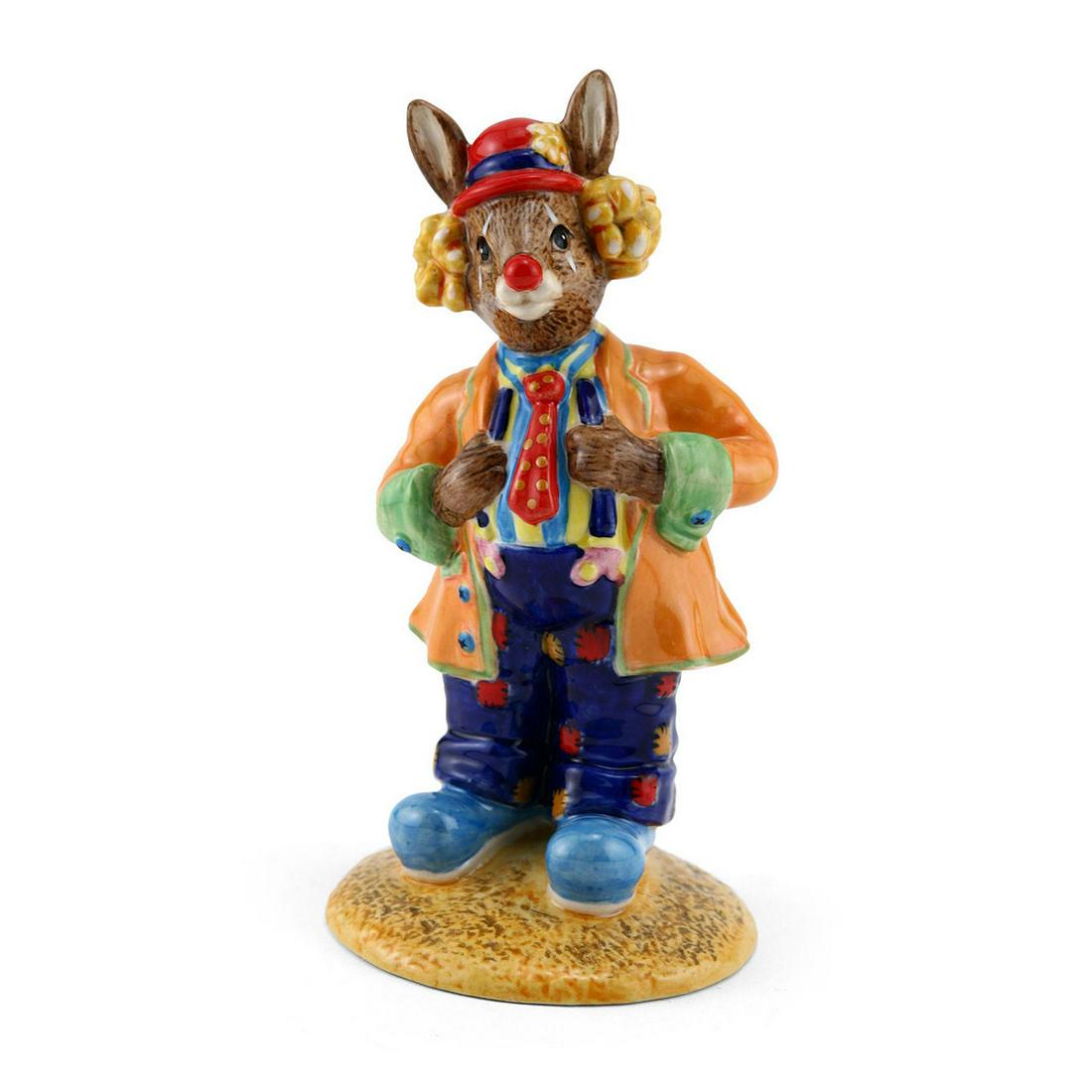 ROYAL DOULTON BUNNYKINS FIGURINE, CLARENCE THE CLOWN: Royal Doulton Bunnykins, Clarence the Clown Bunnykins DB332 (Orange and green jacket, purple trousers with red and orange patches, blue and yellow striped shirt, red hat with blue band). Issued 2005 -