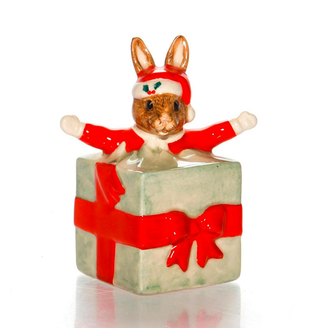 ROYAL DOULTON BUNNYKINS, CHRISTMAS SURPRISE DB146: Red and light green. Signed by Michael Doulton. Stamped. Artist: Graham Tongue Issued: 1994 Dimensions: 3.75"H Manufacturer: Royal Doulton Country of Origin: England