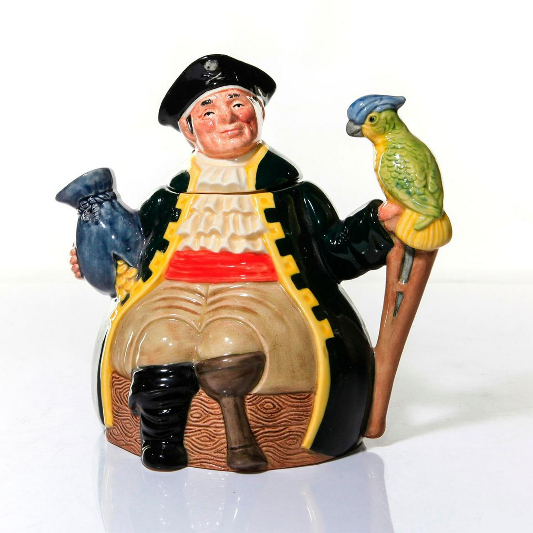 ROYAL DOULTON CHARACTER TEAPOT, LONG JOHN SILVER, D6853: Parrot as the handle. Arm holding a bag of "booty" as spout. Artist: William K. Harper Issued: 1989 Dimensions: 7.5"H Manufacturer: Royal Doulton Country of Origin: England