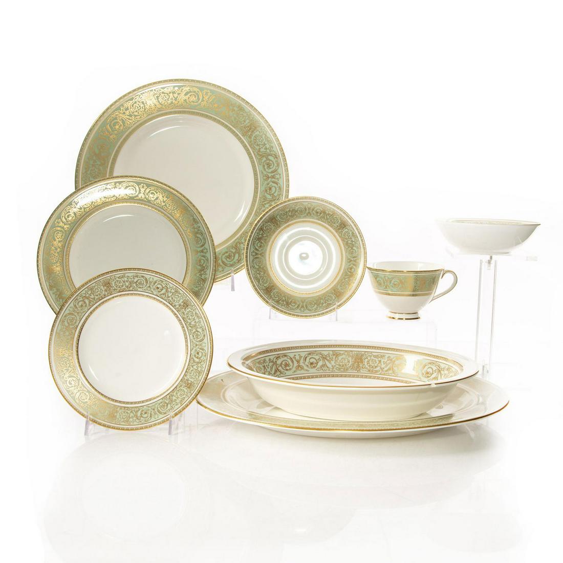 ROYAL DOULTON ENGLISH RENAISSANCE DINNER SERVICE: 5 piece setting for 8, with 4 serving dishes. Fine bone china. Stamped Royal Doulton English Renaissance to bottom. Set is missing 1 small bowl and 1 bread plate. One serving bowl has chip to rim. Iss