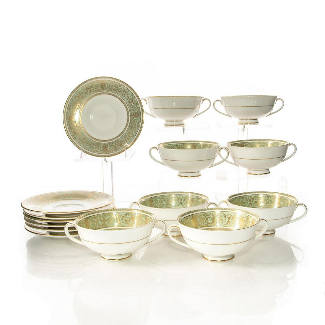 8 ROYAL DOULTON ENGLISH RENAISSANCE SOUP BOWLS, SAUCERS: Double handled bouillon cup, with blue-gray and gilt detail. Fine bone china. Stamped Royal Doulton English Renaissance to bottom. Issued: Late 20th c. Dimensions: 6.25"C, saucer Manufacturer: Royal D