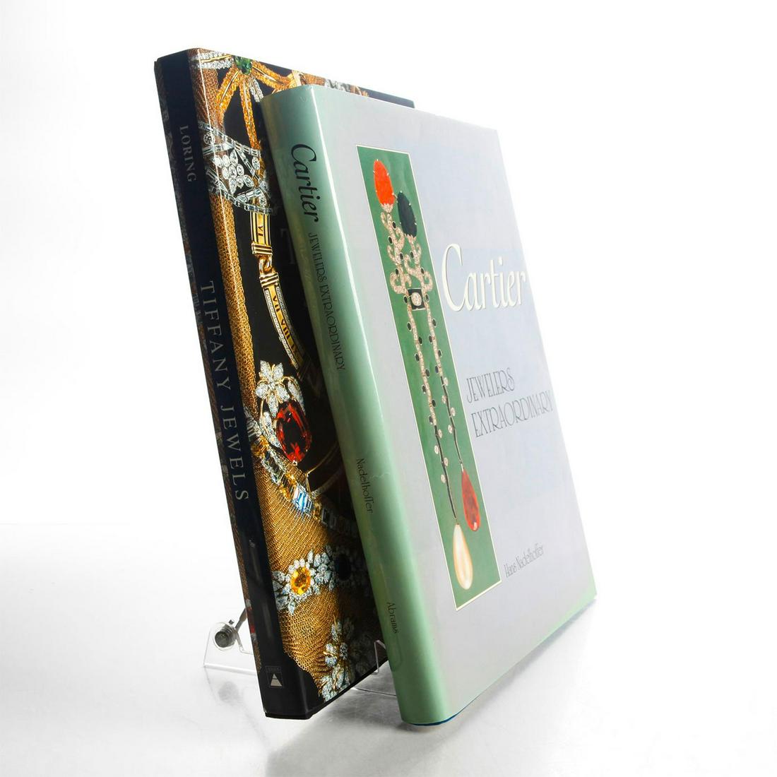 2 BOOKS, CARTIER JEWELERS & TIFFANY JEWELS: Hard cover 310, 240 pp. Hundreds of color and b&w illustrations. Issued: 1984, 1999 Dimensions: 12.5"H x 9.25"W Manufacturer: Harry N Abrams Country of Origin: United States
